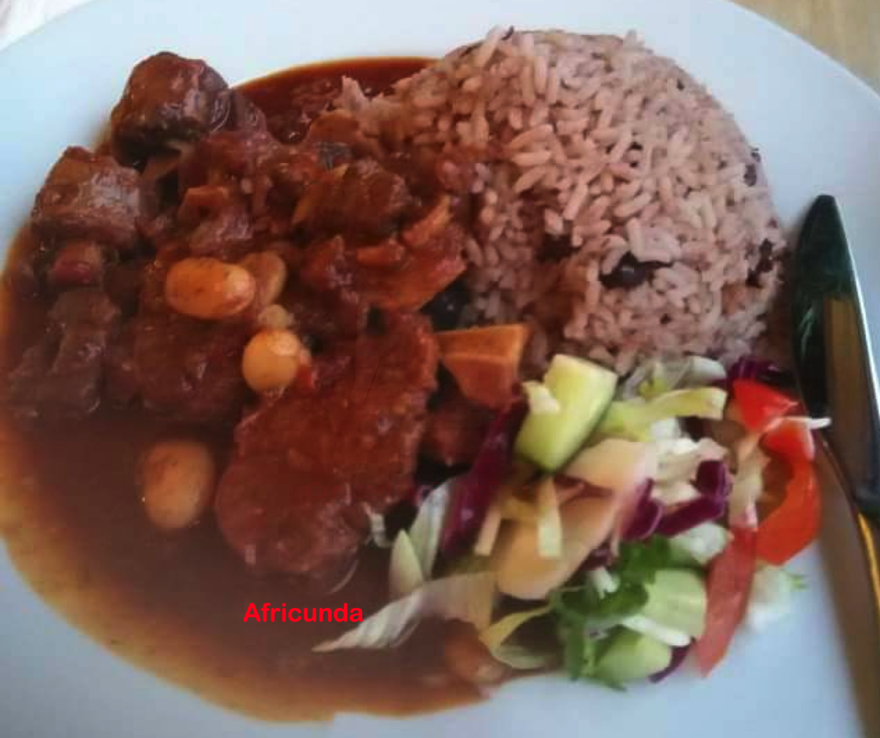 Rice & Beans (Caribbean Style) with sour sauce.